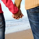 stock-photo-4890702-couple-holding-hands