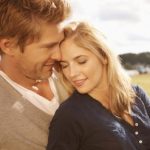 Portrait of romantic young couple spending time together outdoors